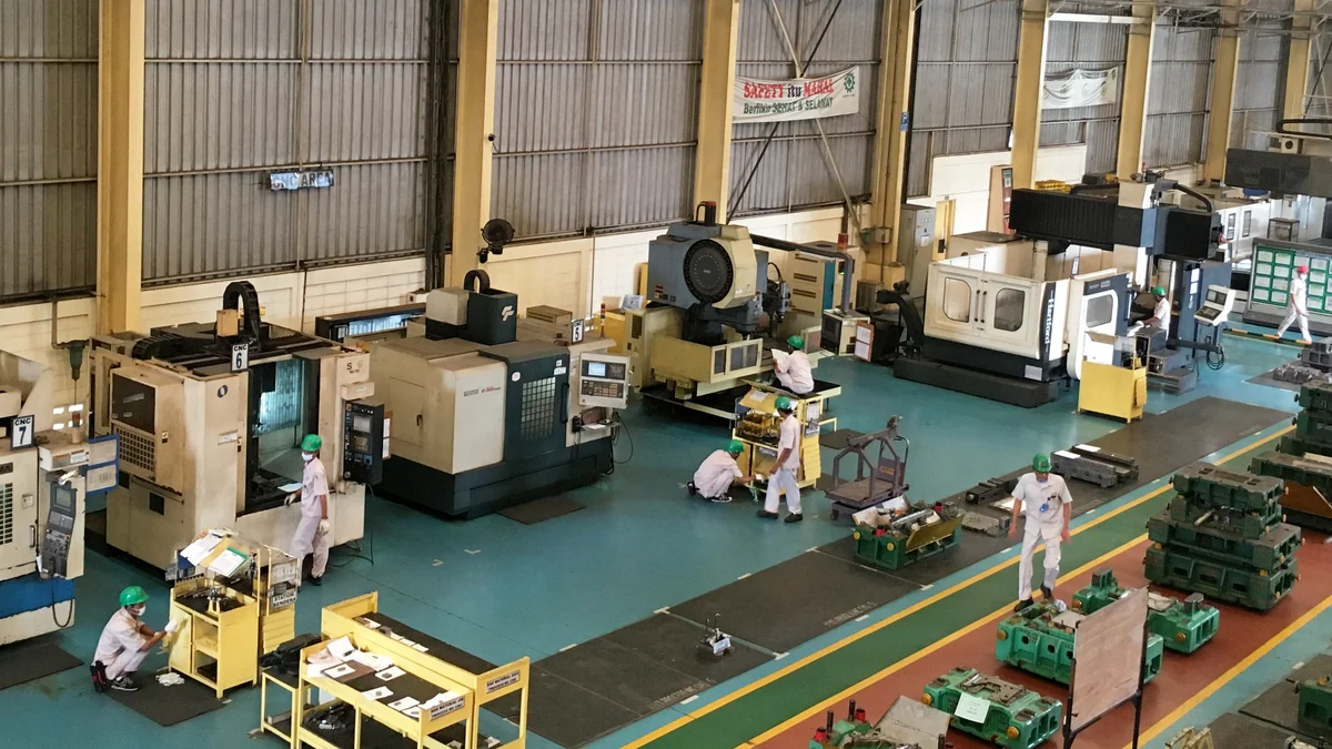 CNC machining facility with multiple machines used to evaluate capacity for custom part quotes