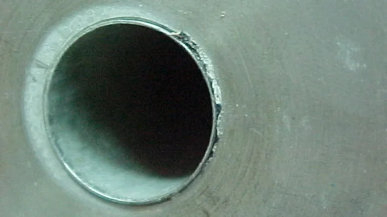 Crevice corrosion on 316 stainless steel showing why CNC material and finish selection matters